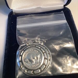 Montana Silversmiths buffalo nickel earrings.